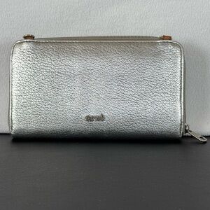 The Sak Convertible Wallet/Clutch in Metallic Silver with Tan Leather Accent